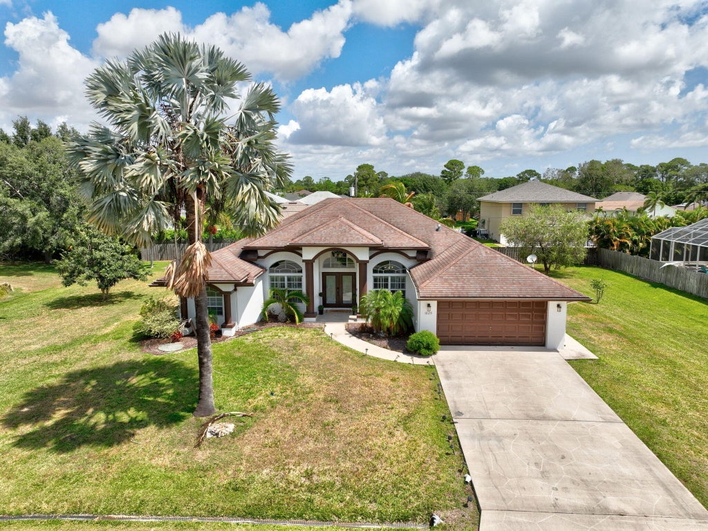 Photo of 1825 SW Kimberly Avenue, Port Saint Lucie, FL 34953 (MLS # R10987914)