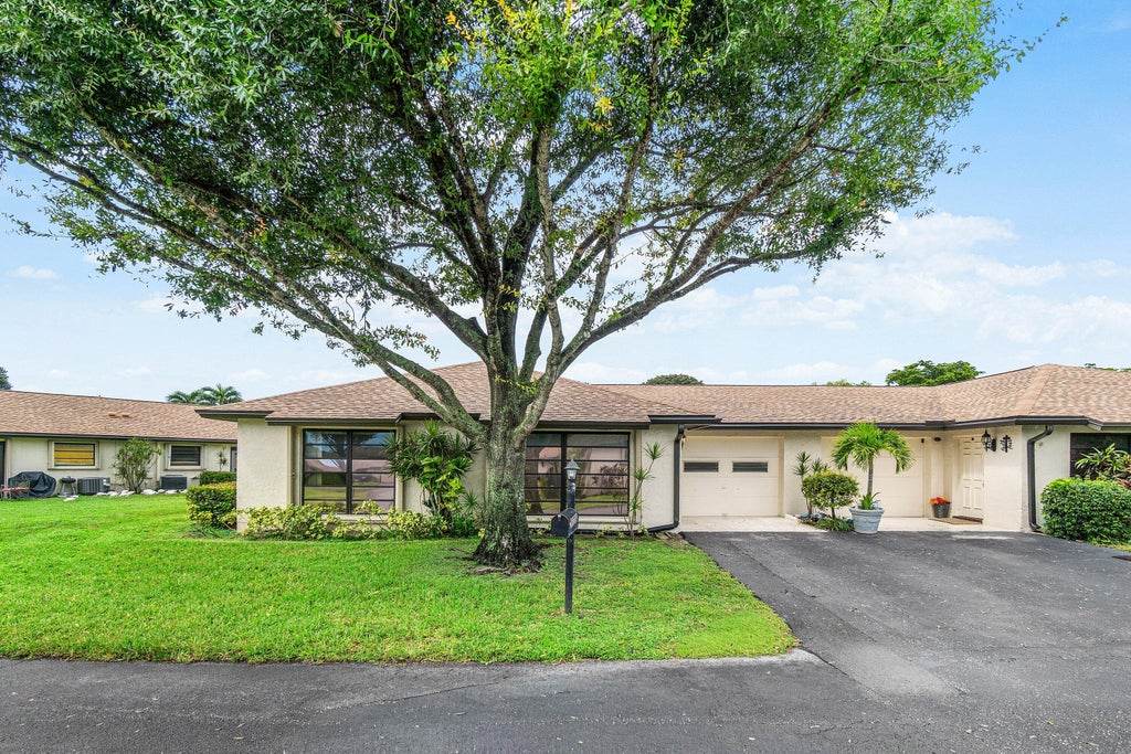 Photo of 4773 Storkwood Place #A, Boynton Beach, FL 33436 (MLS # B26083489)