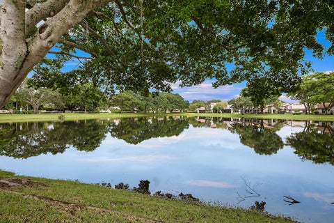 Photo of 702 DEER CREEK NORTH SHORE Drive, Deerfield Beach, FL 33442 (MLS # B26082053)