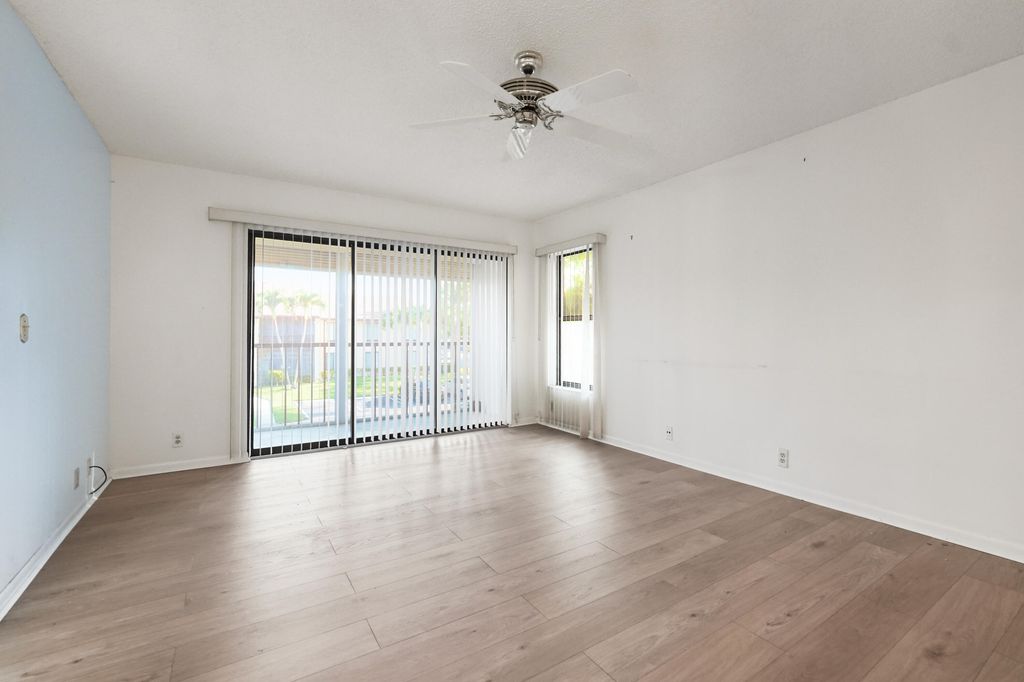Photo of 801 Sky Pine Way #A2, Greenacres, FL 33415 (MLS # R11158738)