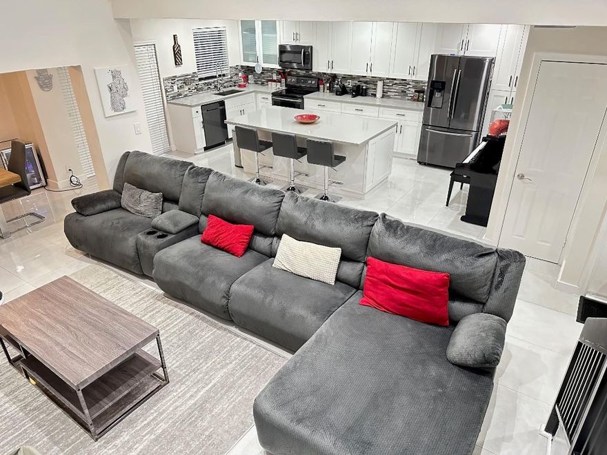 Beautifully renovated home in the heart of Hollywood! Prime location in the sought after Emerald Oaks community. Enjoy some peace of mind in this quiet, gated, and well maintained community. Conveniently located near major highways, shopping plazas, places of worship, restaurants, and walking distance from TY Park. The home includes an oversized kitchen, screened patio, and high ceilings. The neighborhood amentities consist of a spa, pool, and a beautiful walking trail. Come see your future home!