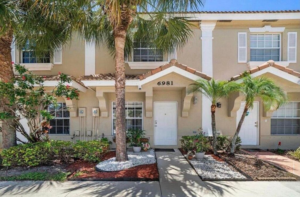 Photo of 6981 Stoney Creek Circle Cir, Lake Worth Beach, FL 33467 (MLS # R10802051)