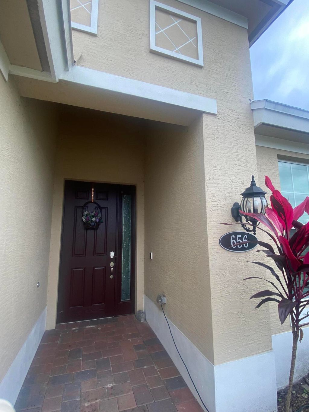 Photo of 656 SW Haas Avenue, Port Saint Lucie, FL 34953 (MLS # R11121923)