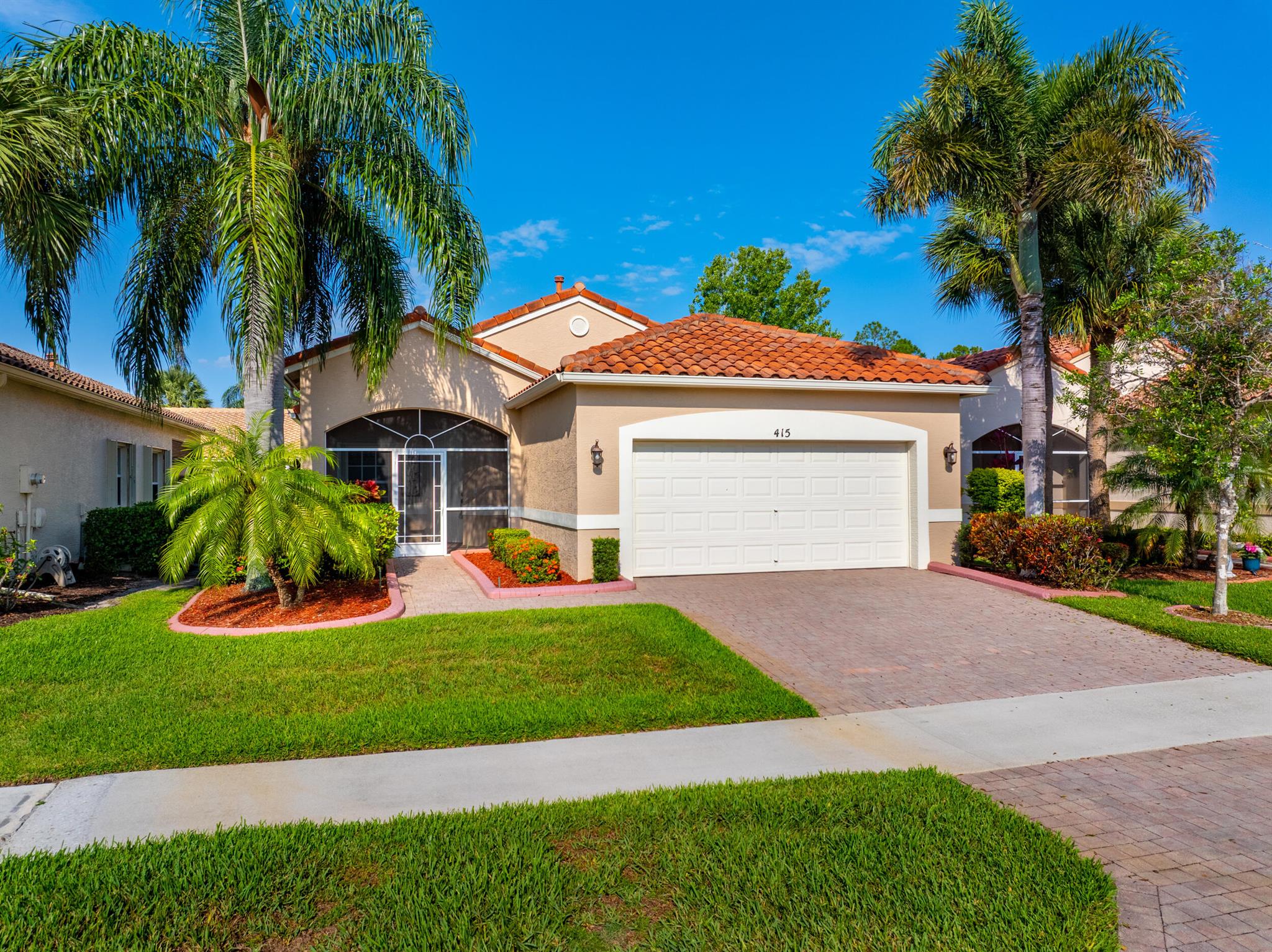 Discover the active adult lifestyle at The Cascades! This meticulously maintained 2-bedroom + flex room home features a large great room that opens to a screened lanai, perfect for relaxing or entertaining. The flex room can serve as a den, office, or guest room. Features include NEWER stainless steel appliances, natural gas, hardwood and tile flooring throughout living areas, accordion shutters, painted garage floor, a huge master closet and more! The Cascades offers a 22,000 sq ft clubhouse with over 50 clubs, card rooms, billiards, crafts, ballroom, fitness and dance studios, plus a 9-hole golf course, pickleball, shuffleboard, tennis, resort-style pool, events, cable, and high-speed internet. Welcome to your forever home!