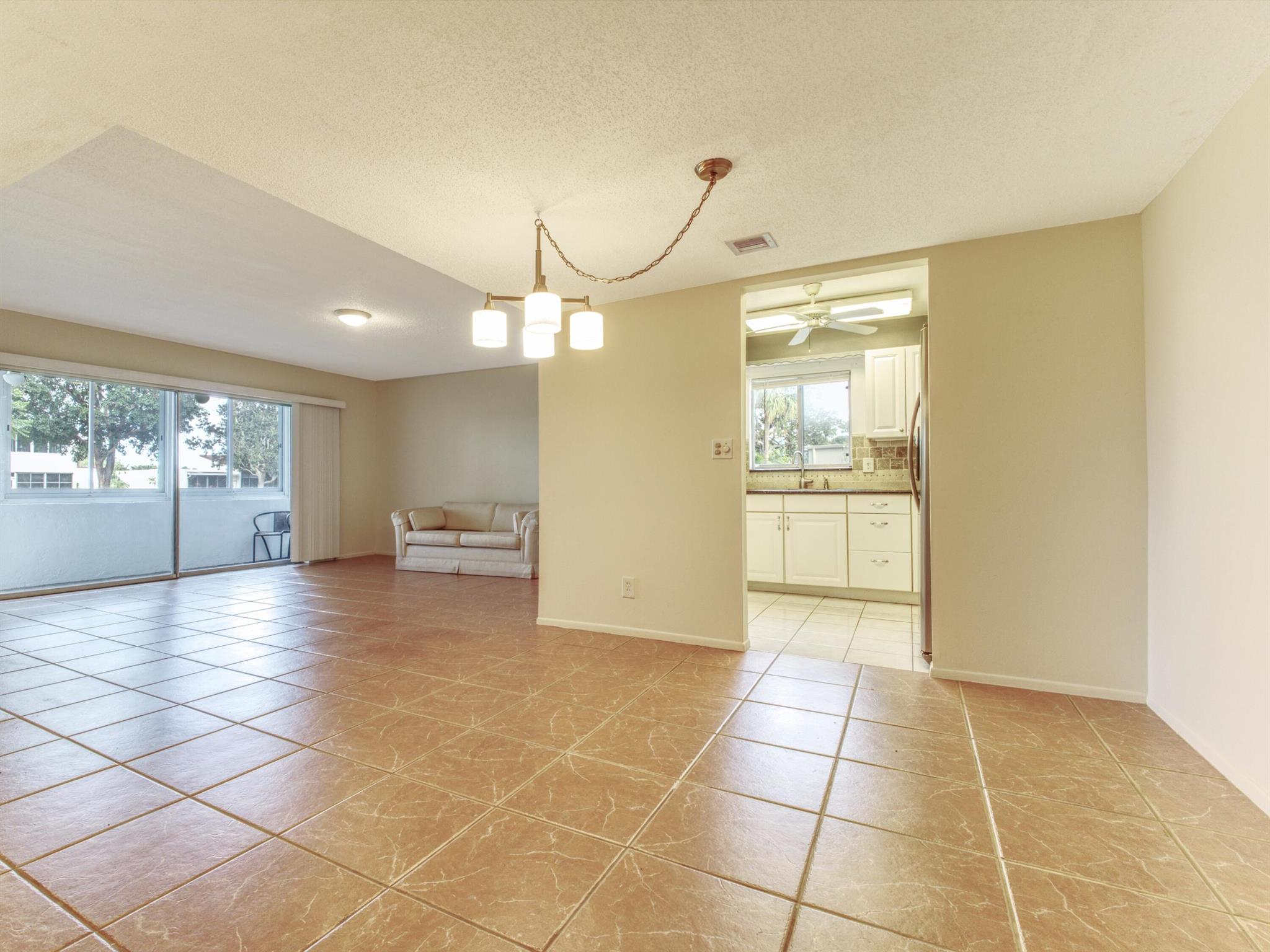 Enjoy this pleasant 1st floor 2 bedroom 2 bath condo in this quaint 55+ community of Boundbrook. Priced to sell, this corner unit features a large living/dining area that opens up to an enclosed private patio. Washer and dryer in unit, master bedroom has a large walk-in closet and private bath. Large guest bedroom has plenty of closet space. Boundbrook Community offered sidewalks, shuffleboard, a lovely heated pool area, clubhouse, canopied seating and outdoor grill area. Fees include cable, water, insurance and maintenance on building and grounds. Dont miss out, call today!