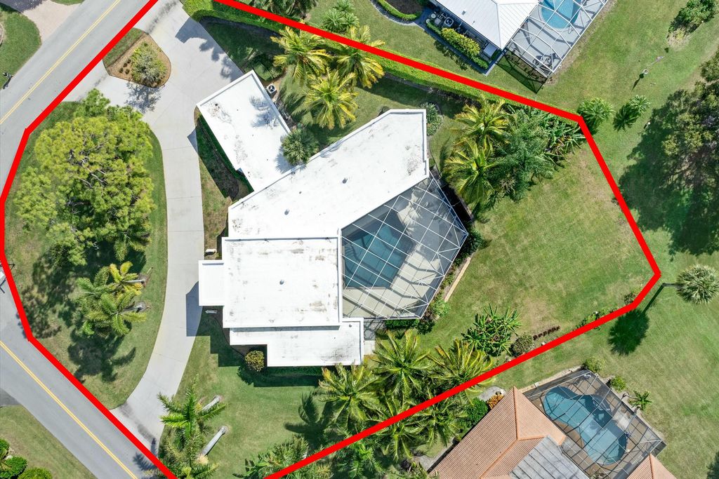 Photo of 301 N Country Club Drive, Atlantis, FL 33462 (MLS # R11059277)