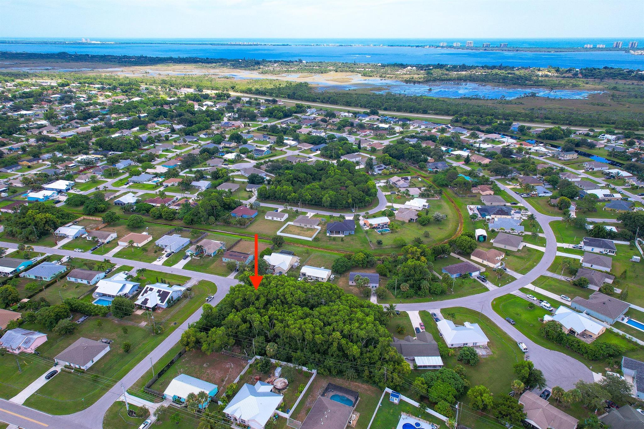 Discover the perfect canvas for your dream home in the heart of vibrant Port St. Lucie! Nestled on a lush, tree-lined corner lot in a mostly developed neighborhood, this .24-acre (10,607 sq ft) parcel offers a rare blend of privacy, space, and convenience. With utilities readily available at the street and no HOA fees or restrictions, you'll have the freedom to design a lifestyle that's truly your own. Port St. Lucie is known for its friendly atmosphere, scenic parks, top-rated schools, and close proximity to beaches, golf, and everyday conveniences. Whether you're planning your forever home or a smart investment, this lot offers a promising start in one of Florida's most desirable coastal communities.