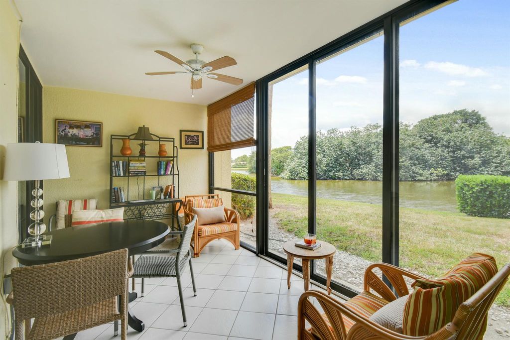 Photo of 5250 Woodland Lakes Drive #128, Palm Beach Gardens, FL 33418 (MLS # R11084718)