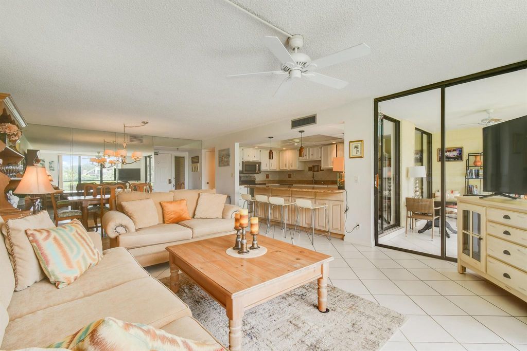 Photo of 5250 Woodland Lakes Drive #128, Palm Beach Gardens, FL 33418 (MLS # R11084718)