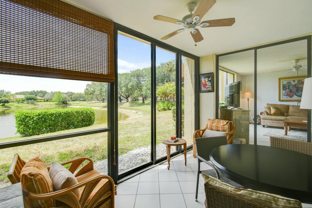 Photo of 5250 Woodland Lakes Drive #128, Palm Beach Gardens, FL 33418 (MLS # R11084718)