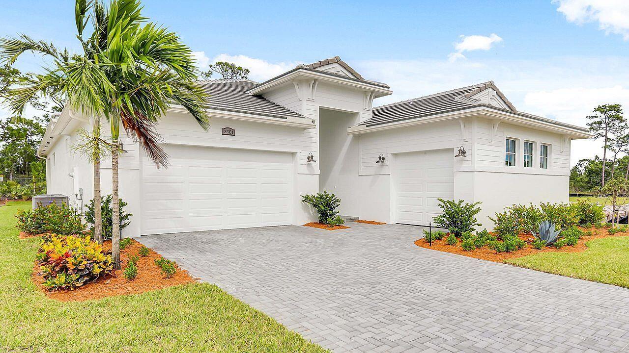 Stunning Brand New, Move-In-Ready 3-Bedroom, 3.5-Bathroom Home with Office & 3-Car Garage! Located in an exclusive boutique community MOSAIC by Kolter Homes, this energy-efficient gem features impact windows and doors, a tile roof, and a chef's gourmet kitchen with quartz countertops, luxury stainless steel appliances, built-ins, and an open floor plan with high ceilings. Oversized sliding glass doors lead to a private lanai overlooking a serene nature preserve. The Owner's Suite includes a large walk-in closet and spacious shower, while each bedroom has its own full bath for added privacy. Enjoy low common charges, modern living, and no flood zone! Close to top-rated schools, shopping, dining, and fishing. Don't miss this rare opportunity--schedule your private tour today!