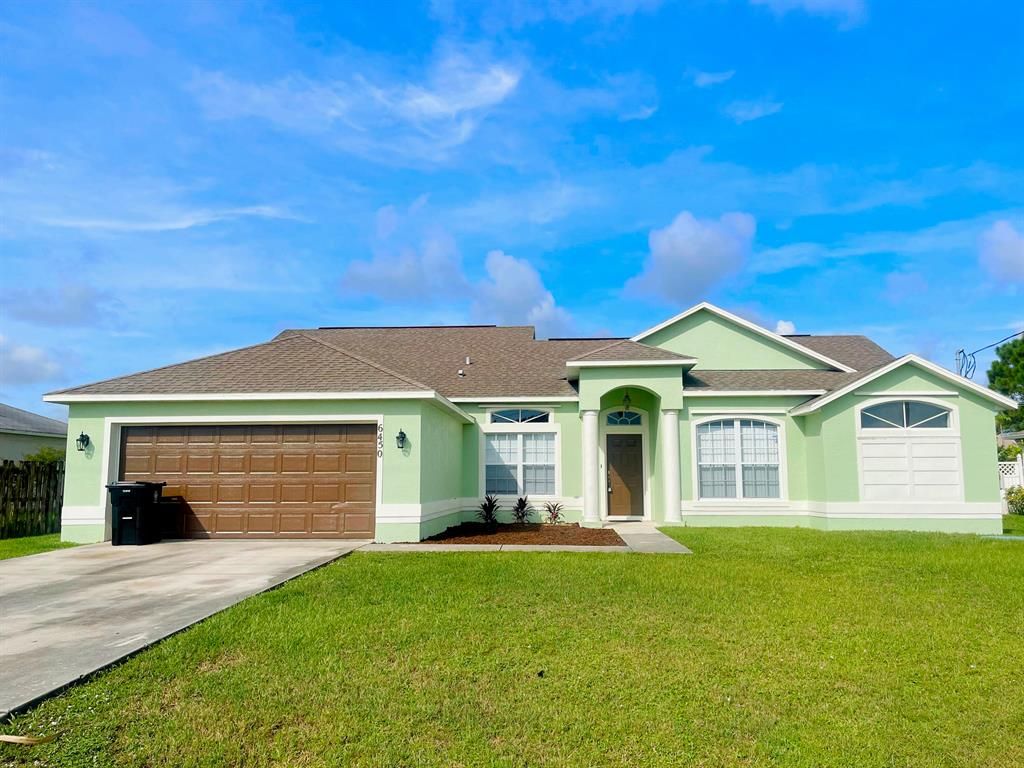 Photo of 6450 NW Colgate Street St, Port Saint Lucie, FL 34986 (MLS # R10828723)