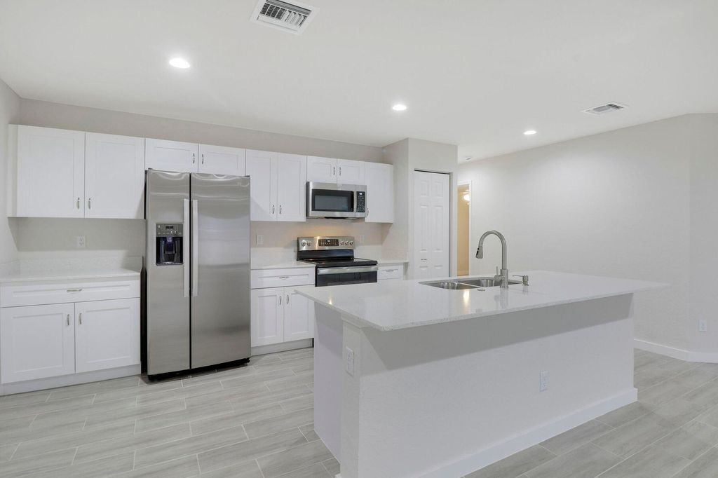 Photo of 2118 SW Alloway Avenue, Port Saint Lucie, FL 34953 (MLS # R11164550)
