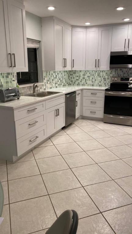 Photo of 21588 San Germain Avenue, Boca Raton, FL 33433 (MLS # R10993857)