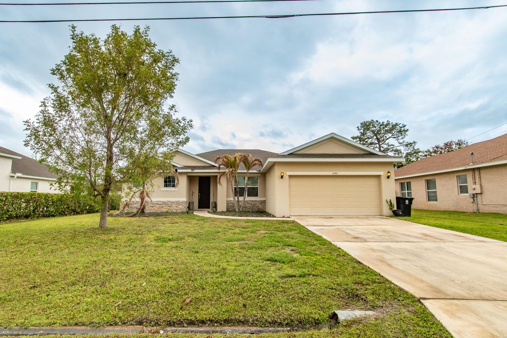 Photo of 1244 SW Ermine Avenue, Port Saint Lucie, FL 34953 (MLS # B26025760)