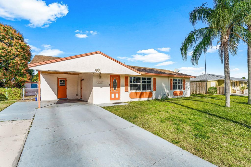 Photo of 330 W 22nd Court, Riviera Beach, FL 33404 (MLS # R11153509)