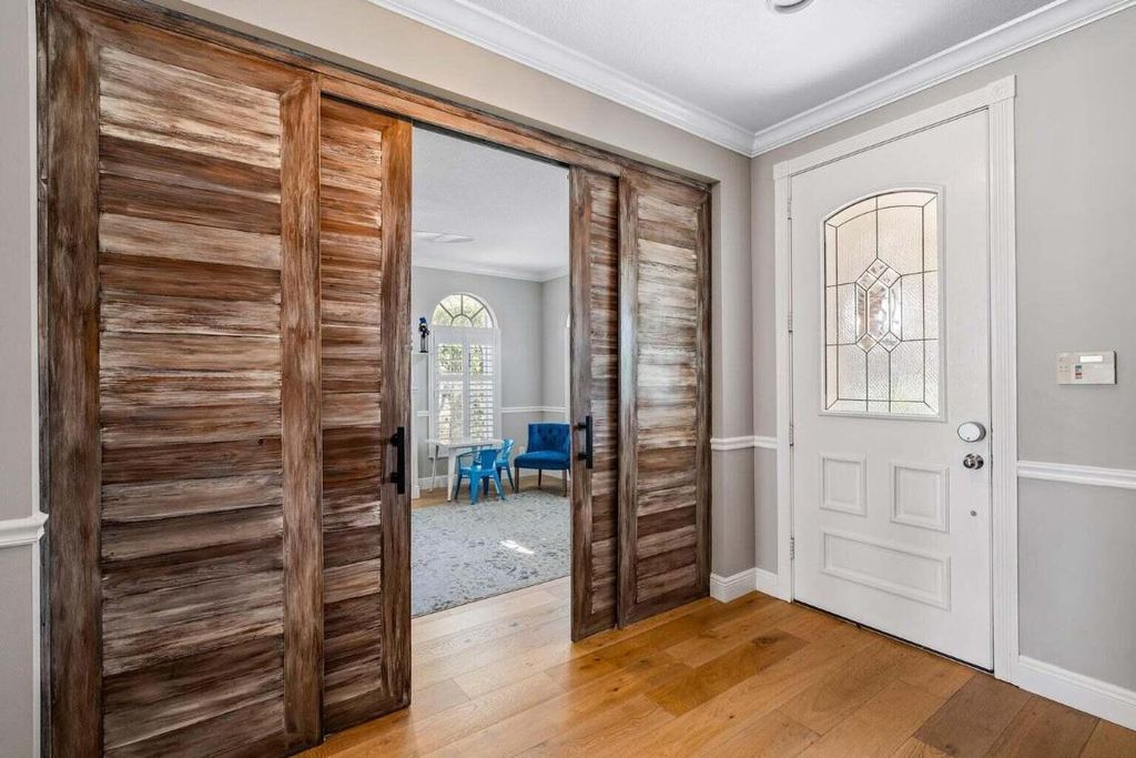 Photo of 3506 Community Drive, Jupiter, FL 33458 (MLS # R10970279)