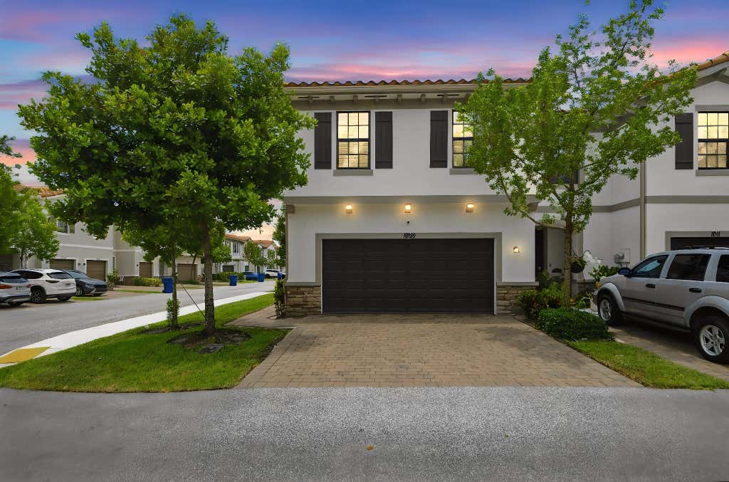 Photo of 1009 Sweet Briar Lane, Riviera Beach, FL 33410 (MLS # B26043642)