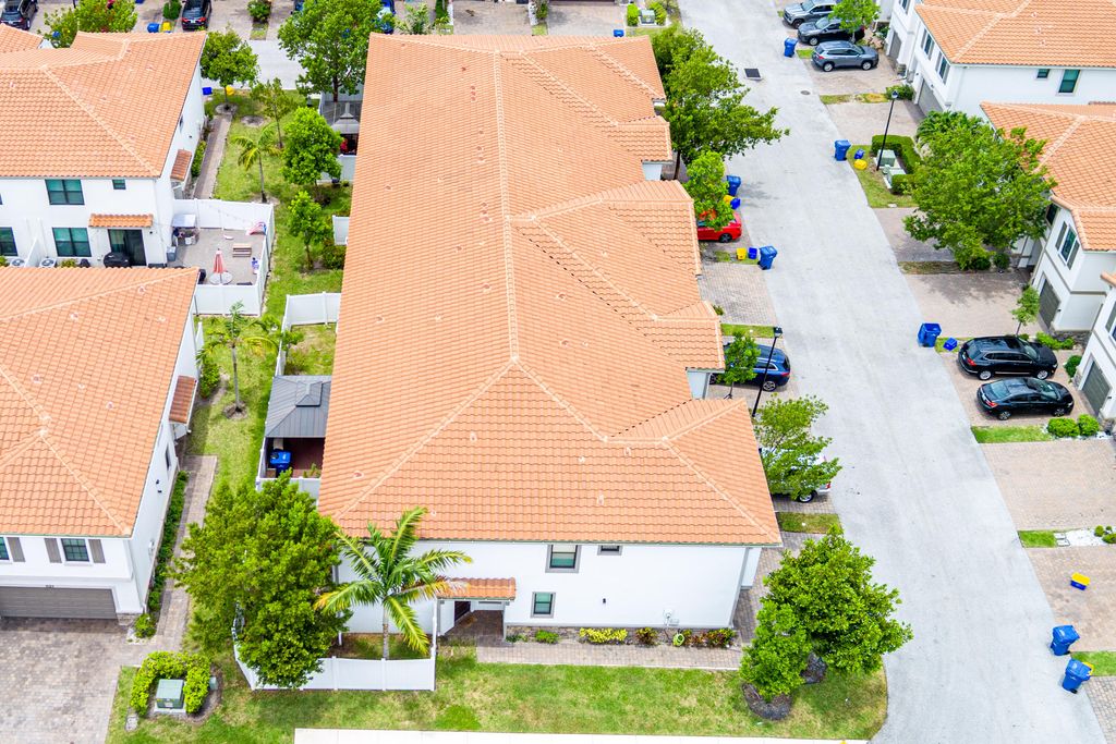 Photo of 1009 Sweet Briar Lane, Riviera Beach, FL 33410 (MLS # B26043642)