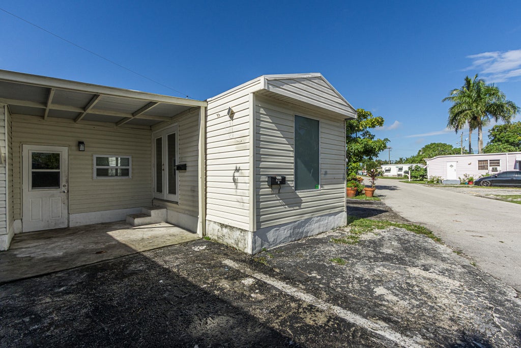 Photo of 2776 NW 29th Place, Oakland Park, FL 33311 (MLS # B26079323)