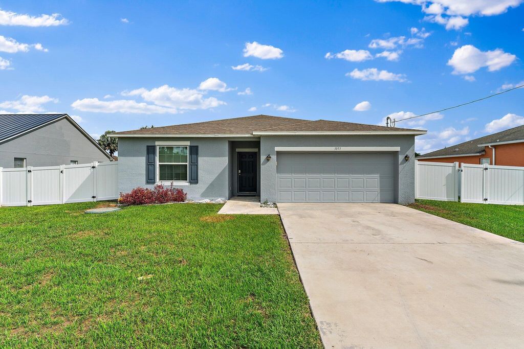 Photo of 1053 SW Coleman Avenue, Port Saint Lucie, FL 34953 (MLS # R11143749)