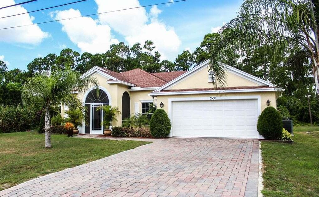 Photo of 3530 SW Conibear Street, Port Saint Lucie, FL 34953 (MLS # R10868850)