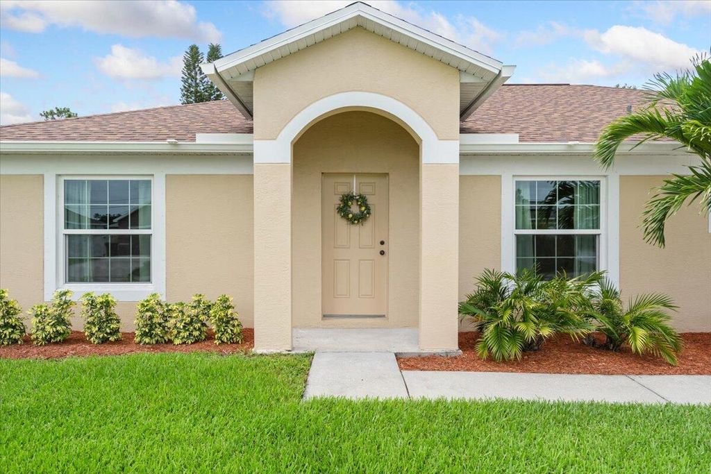 Photo of 516 SW Crawfish Drive, Port Saint Lucie, FL 34953 (MLS # R11103637)