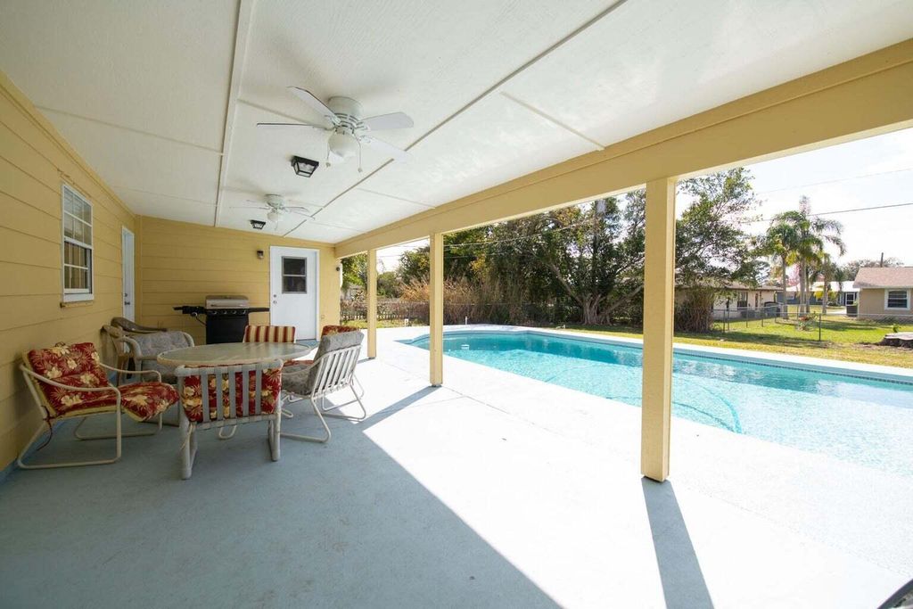 Photo of 2492 SE Pinero Road, Port Saint Lucie, FL 34952 (MLS # R10956356)