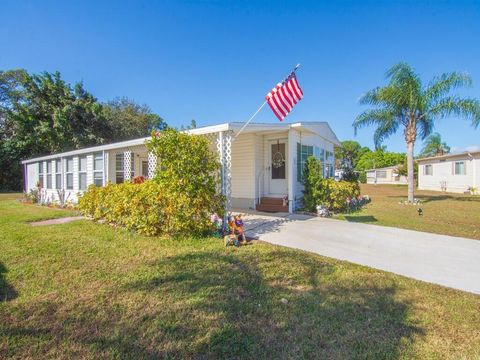 Photo of 10 SE Iberian Lane, Port Saint Lucie, FL 34952 (MLS # R11153660)