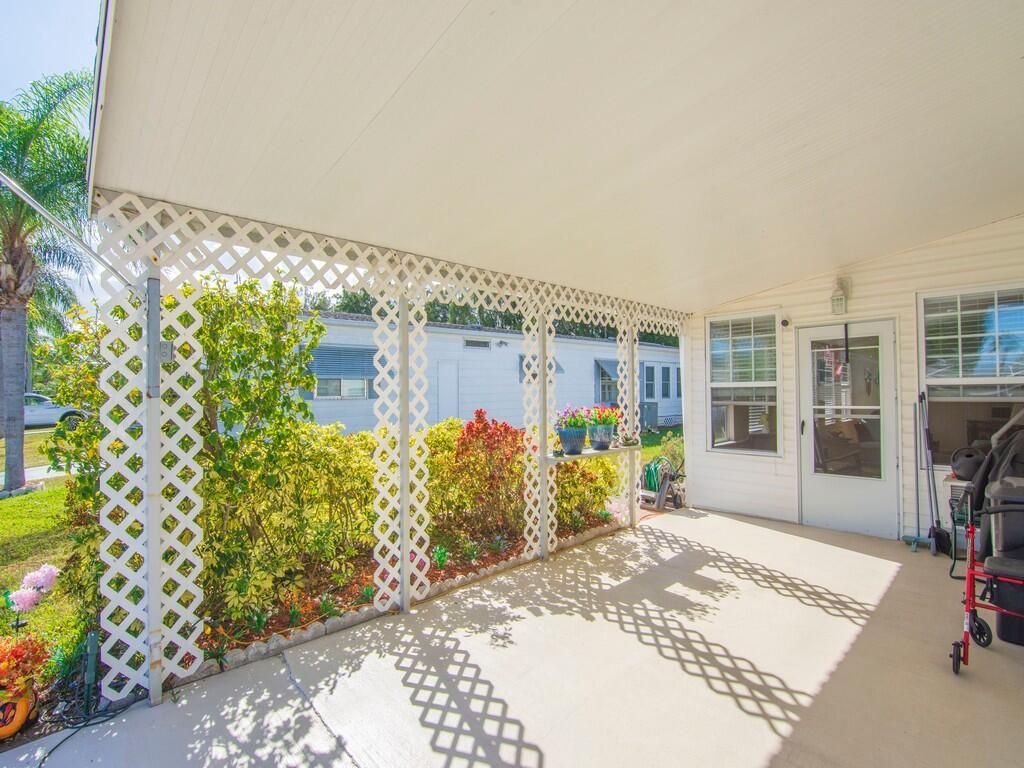 Photo of 10 SE Iberian Lane, Port Saint Lucie, FL 34952 (MLS # R11153660)