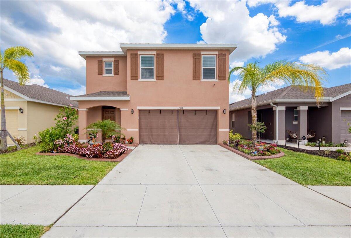 Welcome to your stunning, meticulously maintained home in desirable Central Park! Thoughtful upgrades include lush landscaping with custom curbing, a fenced backyard, and a covered, screened lanai--perfect for outdoor living. The kitchen shines with upgraded appliances, a deep sink, stylish backsplash, pendant lighting, an oversized kitchen island, and a deep walk-in pantry. Inside, enjoy elegant fixtures, custom pantry and laundry doors, a full bedroom and bath on the first floor, and an impressive, oversized master closet upstairs. Don't miss this beautiful home!