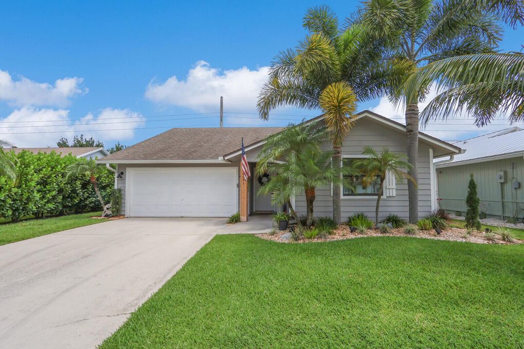 Photo of 6691 SE Raintree Avenue, Stuart, FL 34997 (MLS # R11093089)