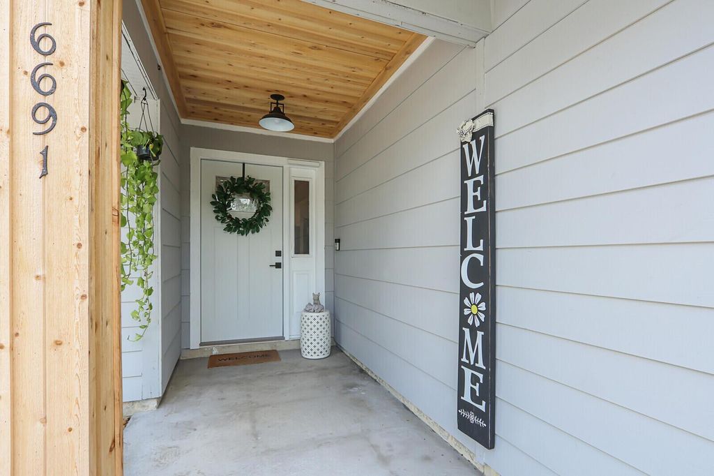 Photo of 6691 SE Raintree Avenue, Stuart, FL 34997 (MLS # R11093089)