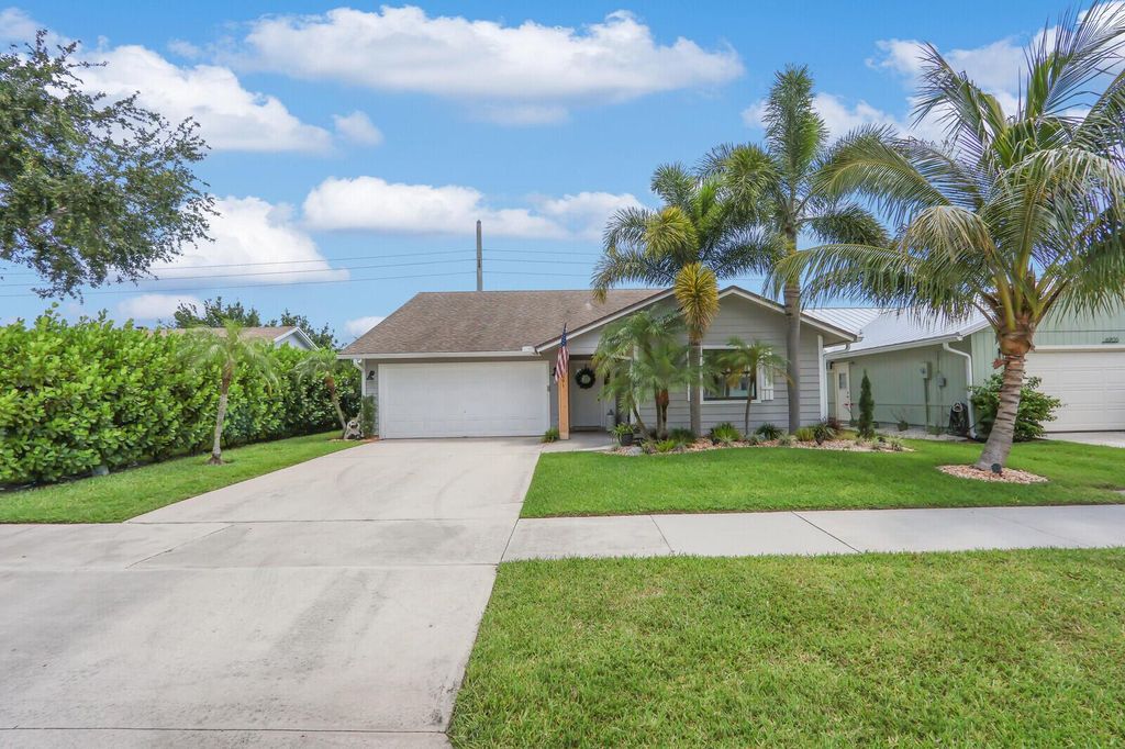 Photo of 6691 SE Raintree Avenue, Stuart, FL 34997 (MLS # R11093089)