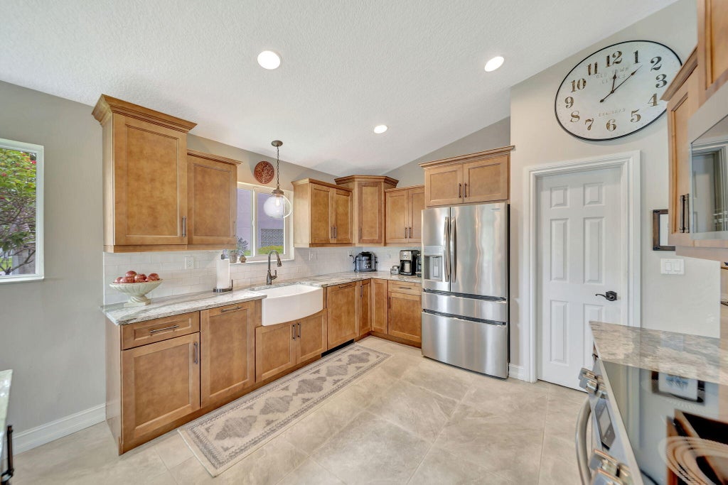 Photo of 5705 NW 48th Court, Coral Springs, FL 33067 (MLS # B26037869)