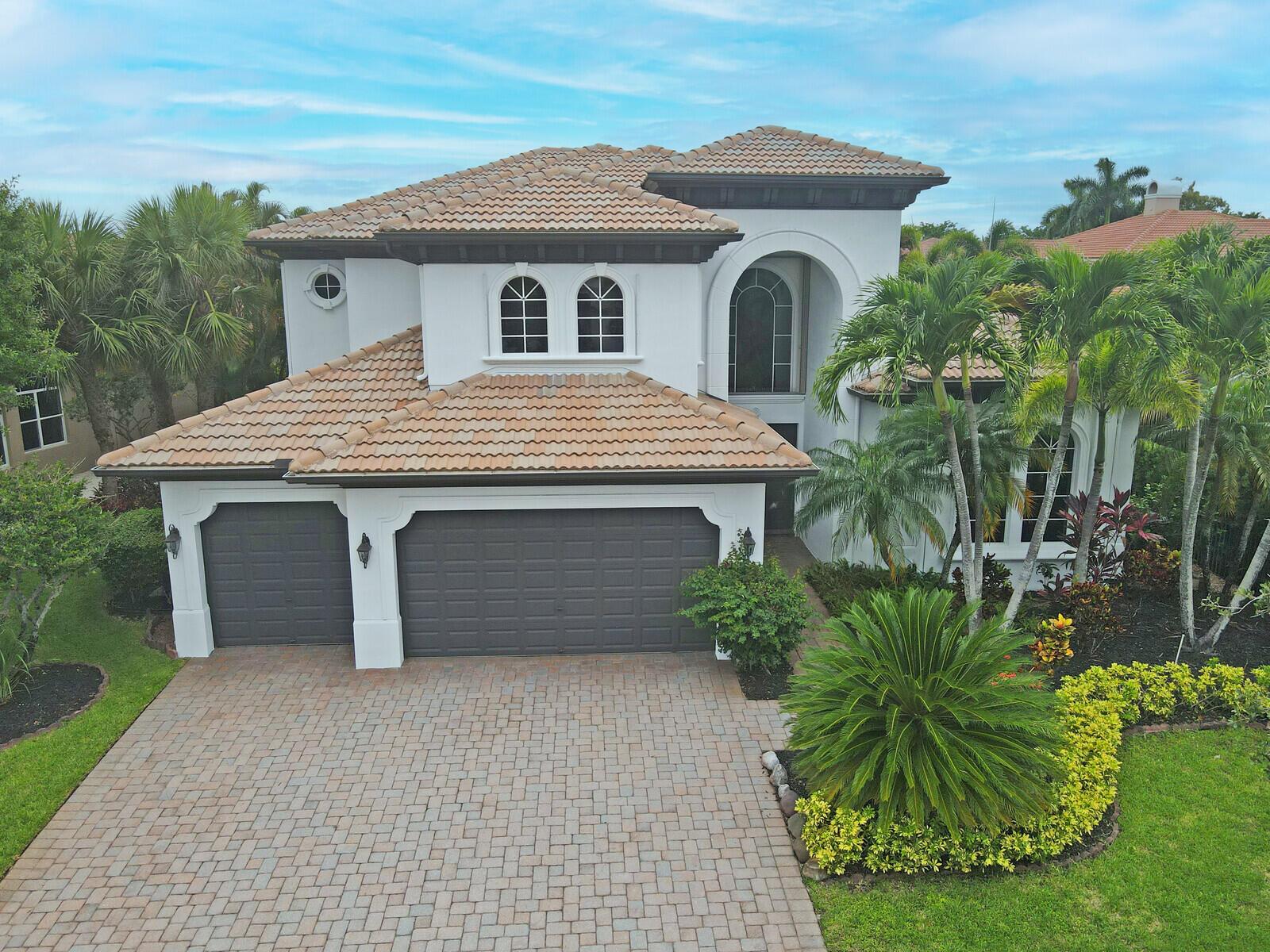 Don't miss this rare opportunity to own a stunning waterfront pool home in the desirable Wellington area. Nestled on a quiet street in the exclusive community of Wellington View, this elegant estate offers the perfect blend of space, privacy, & luxury. Step through the grand double-door entry into a soaring two-story foyer, where floor-to-ceiling windows in the living room showcase breathtaking views of your own tropical oasis. Designed for both comfort & style, this beautifully maintained home features a freshly painted exterior (2025), ACCORDION HURRICANE SHUTTERS, a newer whole-house water softener (2022), and a newer pool heater (2022). Additional highlights include tray ceilings, crown molding, diagonally laid tile, a striking wood staircase, and ample recessed lighting that ...