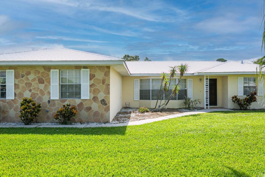 Photo of 1802 SE Elrose Street, Port Saint Lucie, FL 34952 (MLS # R10923521)