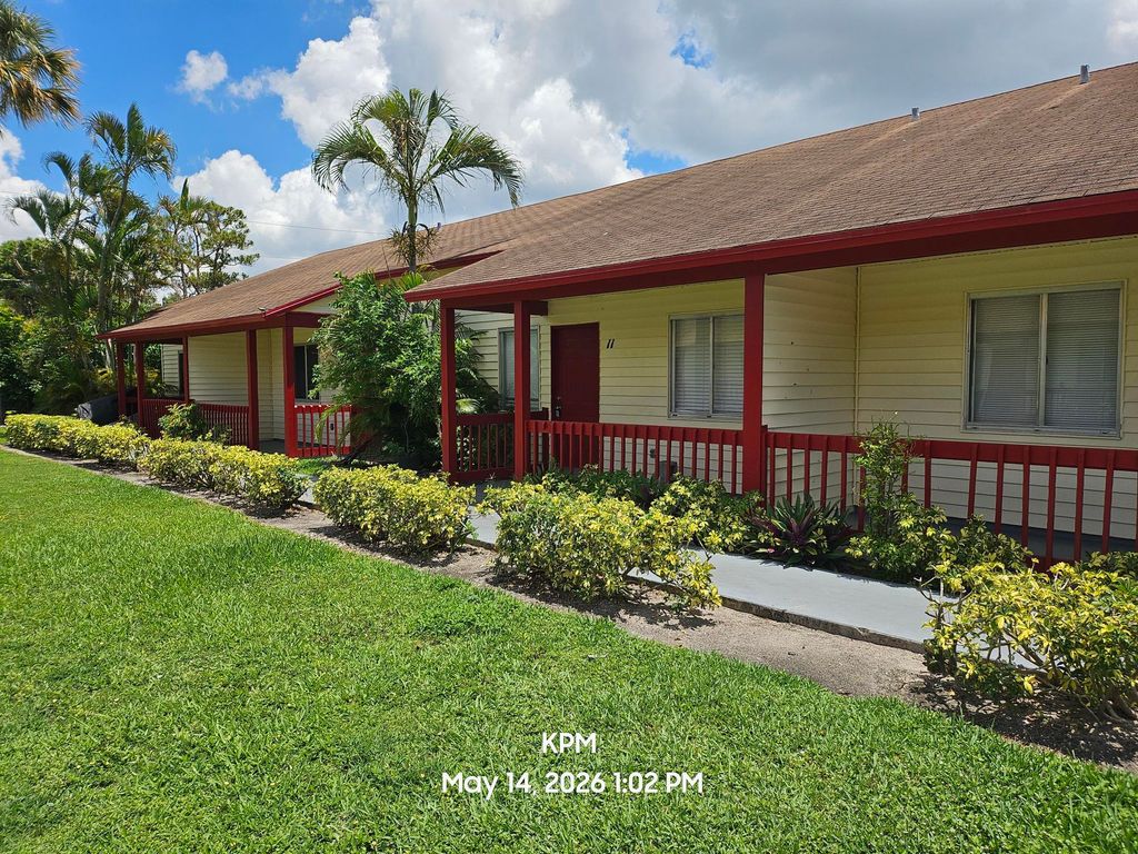 Photo of 1305 Rosewood Villa Lane, West Palm Beach, FL 33417 (MLS # B26028624)