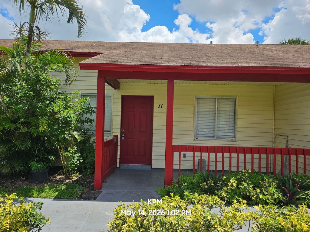 Photo of 1305 Rosewood Villa Lane, West Palm Beach, FL 33417 (MLS # B26028624)