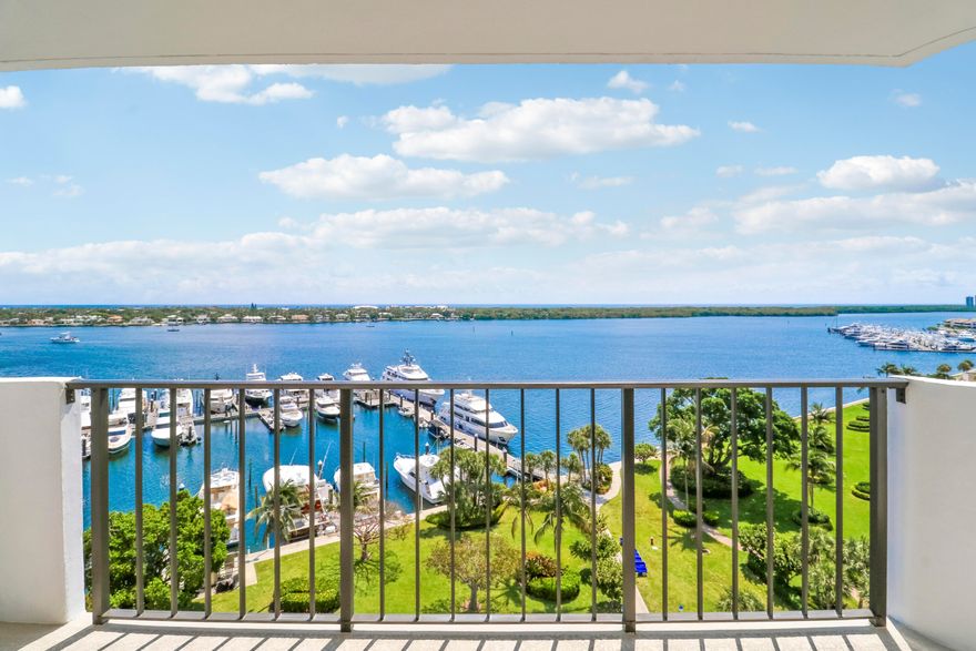Rarely available, direct East facing condo with breathtaking views of the Atlantic Ocean, intercoastal waterway and the marina. Indulge in million-dollar views from every room at half the cost. The unit has been meticulously renovated from top to bottom using the highest quality appointments and a neutral color pallet. The kitchen boasts a breakfast bar, quartz countertops with full height backsplash, under cabinet lighting, brand new stainless appliances including an in-range air fryer, and space saving all in one washer / dryer. Spa like bathrooms with brushed gold finishes appeal to even the most discerning buyer. Brand new hurricane impact windows and doors. Under building, covered garage parking with premium assigned spot. Building amenities include pool, tennis courts, shuffleboard, loggia room for social events and a library. All of this, in the highly sought-after community of Old Port Cove, which covets a gatehouse with security, 2-mile waterfront walking trail, waterfront dining and cocktails at Belle's, the onsite restaurant and boat slips available through Safe Harbor Marina, all just steps from your front door.