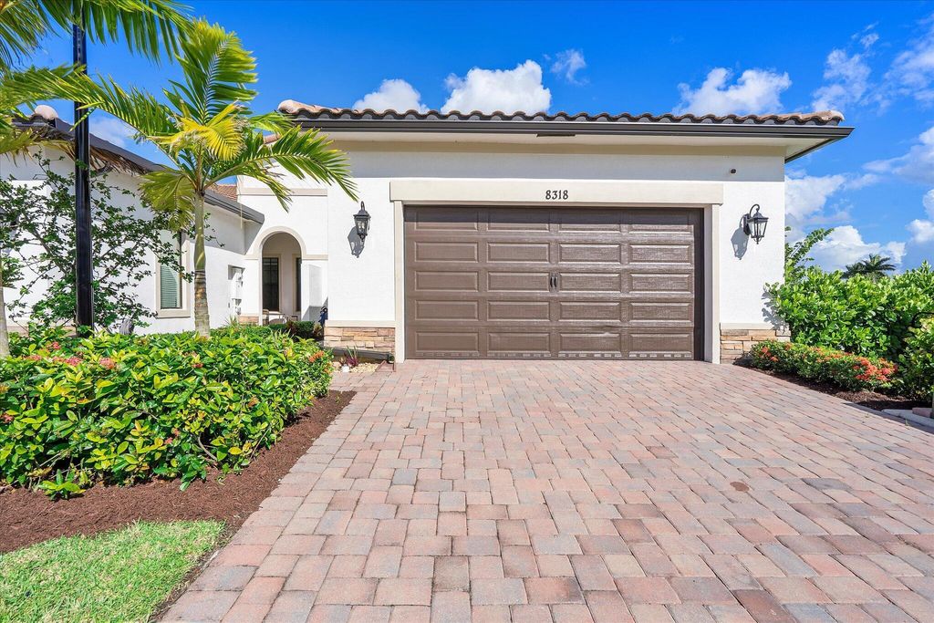 Photo of 8318 W Blue Spring Drive, Parkland, FL 33067 (MLS # R11128540)