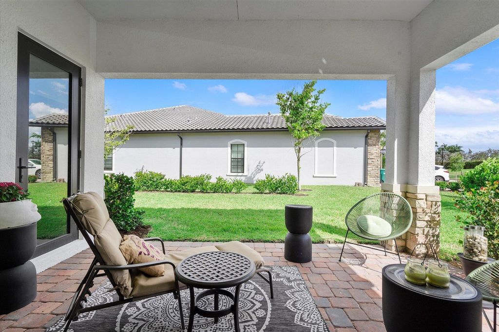 Photo of 8318 W Blue Spring Drive, Parkland, FL 33067 (MLS # R11128540)