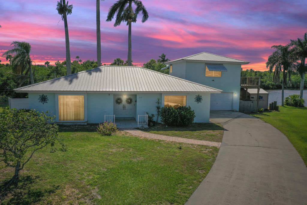 Photo of 314 Holly Avenue, Port Saint Lucie, FL 34952 (MLS # R10791857)