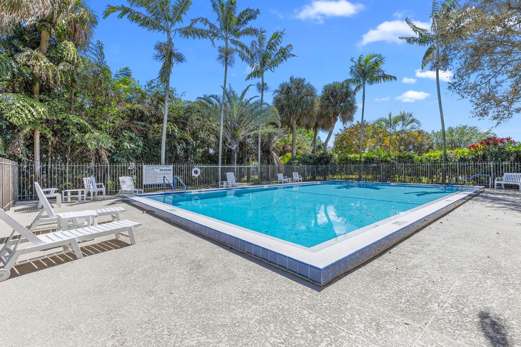 Photo of 411 NW 65th Terrace, Plantation, FL 33317 (MLS # B26001719)