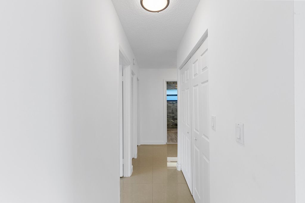 Photo of 411 NW 65th Terrace, Plantation, FL 33317 (MLS # B26001719)