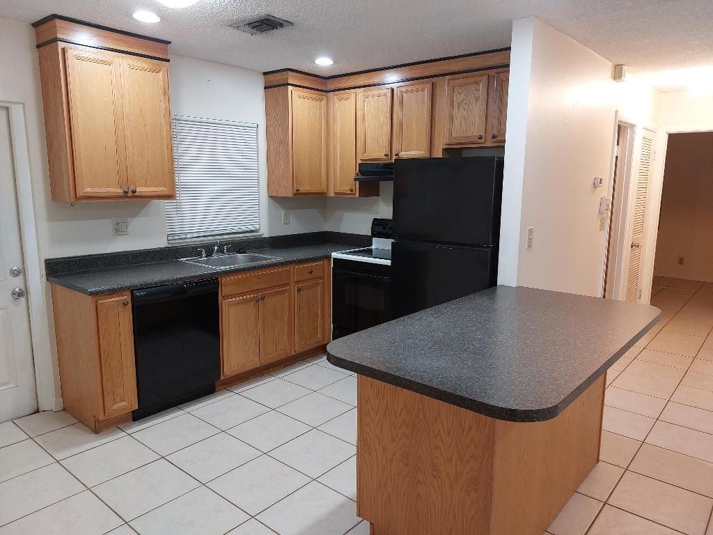 Photo of 300 Hugh Street, Jupiter, FL 33458 (MLS # R10969598)