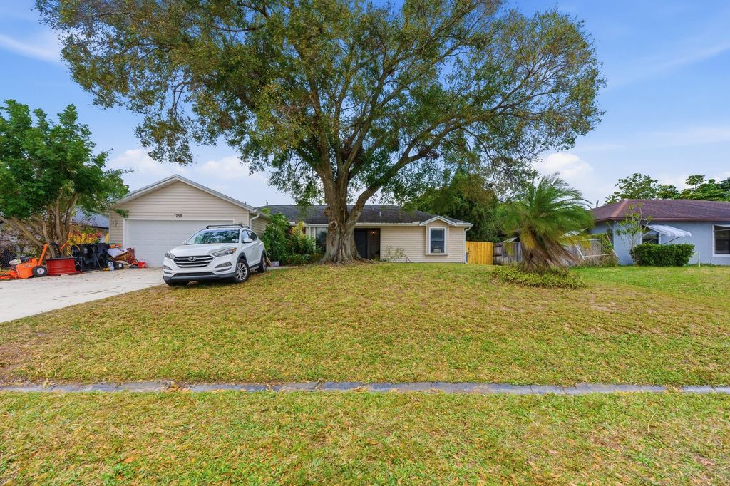 Photo of 1258 SW Cynthia Street, Port Saint Lucie, FL 34983 (MLS # B26015475)