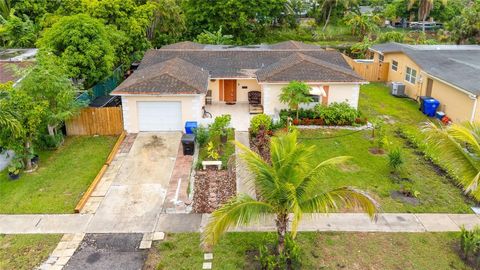 Tiny photo for 970 SW 67th Avenue, North Lauderdale, FL 33068 (MLS # F10512596)