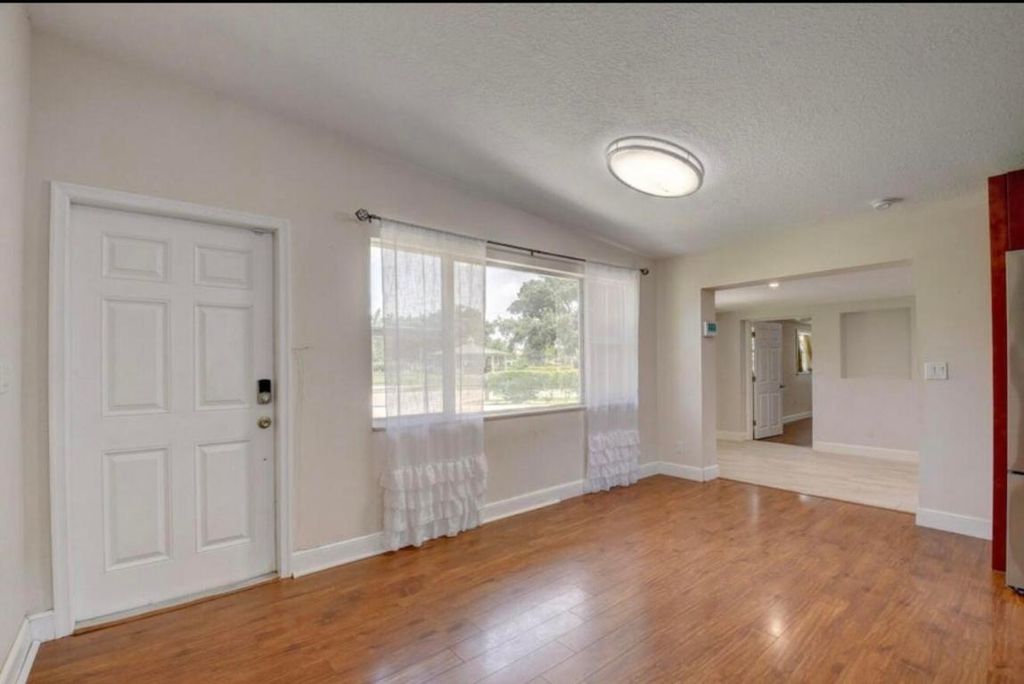 Photo of 612 Hibiscus Drive, Royal Palm Beach, FL 33411 (MLS # R11158581)