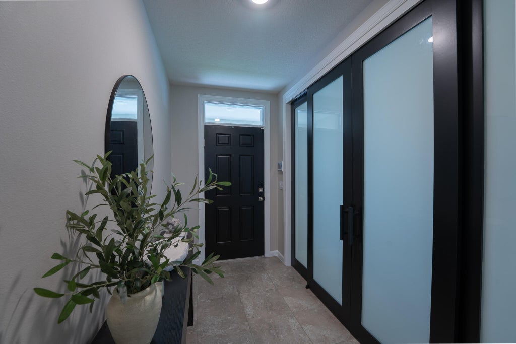 Photo of 11001 SW Tessili Way, Port Saint Lucie, FL 34987 (MLS # B26075643)